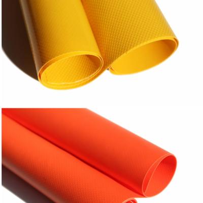 China 610gsm Waterproof Tarpaulin Roll Fabrics Plastic Vinyl Fabric 0.9mm PVC Tarpaulin Roll for sale