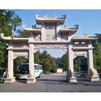 China A grande pedra da torre da porta cinzelou a arcada para o arco chinês da pedra do jardim da paisagem da tradição da cidade antiga para o uso exterior à venda
