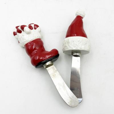 China Christmas Santa Hat Boot Hand Painted Handle With Stainless Steel Blade Cheese Spreader Butter Spreader for sale