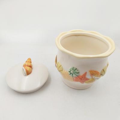 China Jar de almacenamiento de cerámica con tapa cerámica con conchas de mar y porcelana tazón de azúcar color personalizado en venta