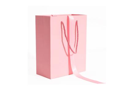China Custom Logo Romantic Pink Underwear Shopping Paper Bag With Rope Handles for sale
