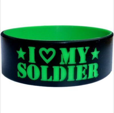 China Recycled Big Black Silicone Wristband Bracelet  , Silicone Wristbands With A Message for sale