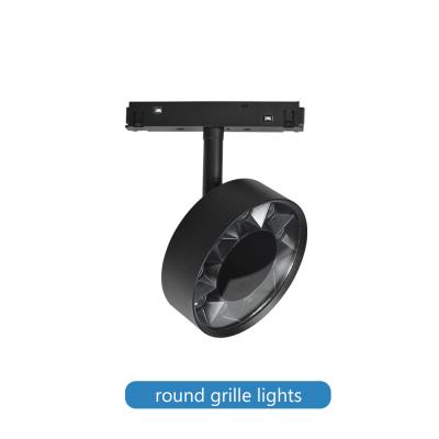 China Lámpara de rejilla de iluminación para el hogar de la sala de estar del proyector de la pista magnética redonda de 9w en venta