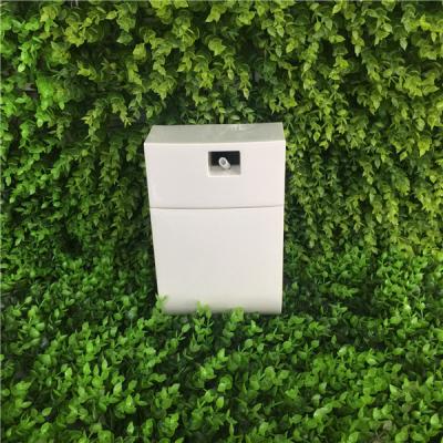 China Washroom Plastic Automatic Air Freshener Dispenser Machine With Timer And Inside Fan for sale