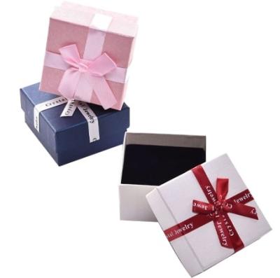 China Small CMYK Fresh Gift Box Necklace Earring Clip PMS Jewelry Bow Box Carton for sale