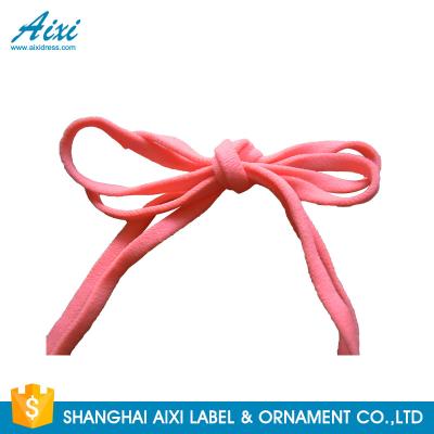 中国 ニット ポリエステル ゴムひもの生地の綿テープ伸縮性がある結合テープ 販売のため