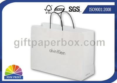 China Elegant White Kraft Paper Tote Bag / Paper Shopping Bags with Handles for Garment Packaging for sale