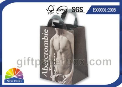 China Luxury Paperboard Custom Paper Shopping Bags with String Handle for Clothing Packaging for sale