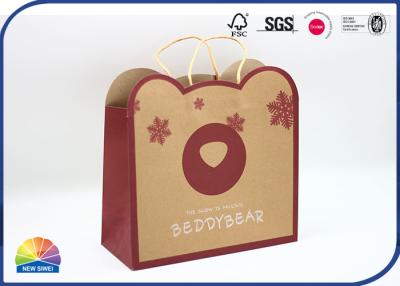 China Recicle las bolsas de papel de Brown Kraft para el regalo de la Navidad con las manijas de papel torcidas en venta