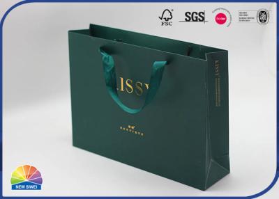 China 350g Green Coated Shopping Paper Gift Bags Customized Logo With Silk Handle for sale
