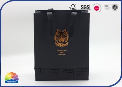 China Black Customized Lion Logo Paper Gift Bag Gold Hot Stamping With Silk Handle for sale