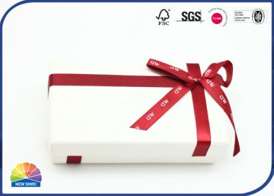 Chine Grain de bois sur boîte-cadeau en papier papier adhésif des deux côtés avec nœud papillon en ruban rouge à vendre