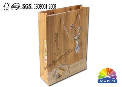 China Promotional Matte Laminated 180GSM Kraft Paper Bags Tea Products Paper Gift Bags for sale