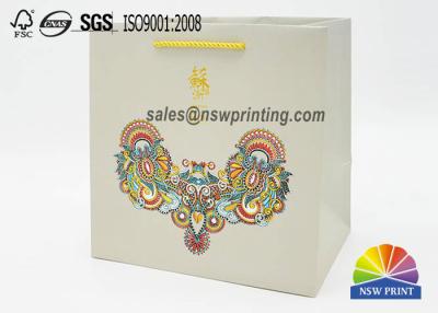 China Matte Laminate Shopping Gift Packaging White Kraft Paper Bag for sale