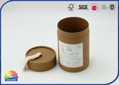 China Ribbon Handle Brown Cylinder Kraft Paper Tube 4c Print for sale