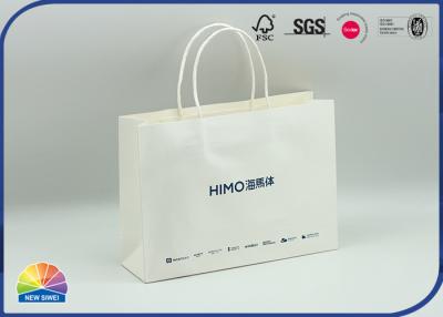 China Custom Printing Logo White Paper Shopping Bag Stand Up Kraft Bag for sale