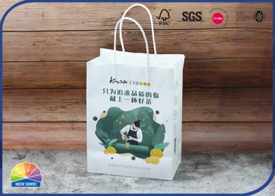 China Las compras biodegradables del papel del retículo empaquetan reciclable con la manija de la torsión en venta