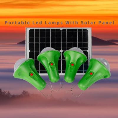 China 4*50PCS LED Solar Energy Kit Solar Led Home Lighting System With Phone Charging for sale