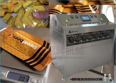 Chine Miel | Machine de remplissage de barre de chocolat et emballeur de cachetage pour le sac En forme pré | Sachet à vendre