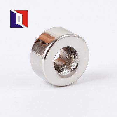 China Industrial Custom Strong Neodymium Countersunk Round Magnet With Screw Hole for sale
