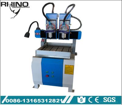 China Máquina de corte dobro do router do CNC da máquina do router do CNC do molde de metal das cabeças para o aço à venda