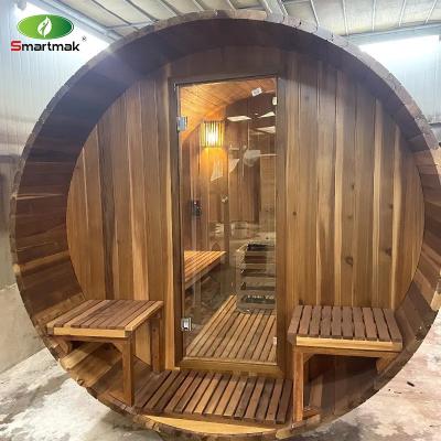 中国 Solid Wood Red Cedar Sauna Dry Wet Steam Outdoor Barrel Sauna Room 販売のため