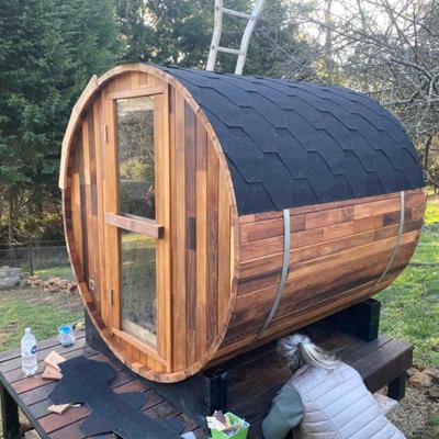 China Solid Wood Outdoor Barrel Sauna Hemlock Cedar Wood Wet Steam Traditional Sauna Room for sale