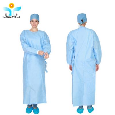 China SMS Non Woven Surgical Gown Blue Breathable Sterile Disposable Gowns for sale