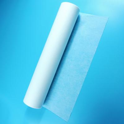 Chine La feuille protectrice de couvre-lit jetable d'examen de prix usine roulent le tissu non-tissé pp PP+PE à vendre