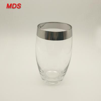 China Hot sale egg shape 400ml silver rim glass tumbler for drinking for sale