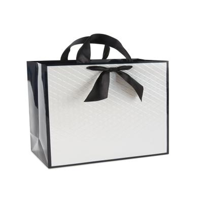 China Silk Ribbon Printed Paper Carrier Bags 110*50*190mm Plain Gift Bags ODM for sale