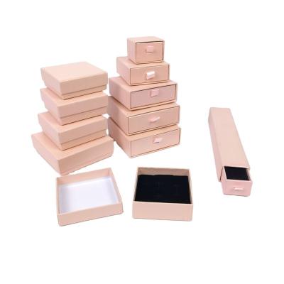 China 250gram Ivory Board Magnetic Jewelry Boxes Earring Packaging With VAC Tray for sale