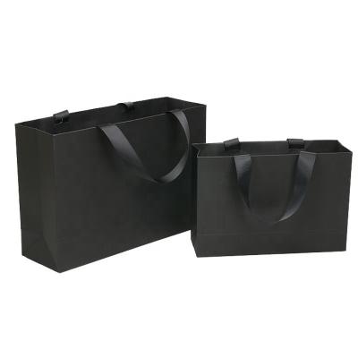 China B9 W9 Corrugated Luxury Black Printed Paper Carrier Bags ODM LOGO for sale