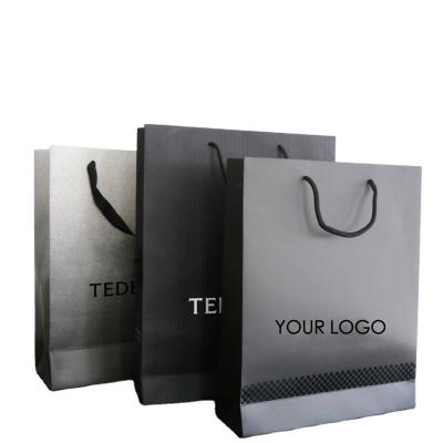 China PMS 300gsm CCNB Jewelry Packaging Paper Black Shopping Bags for sale
