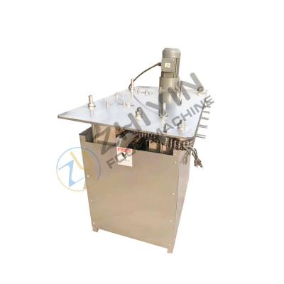 China Automatic chicken feet processing machine stainless steel operating table for sale