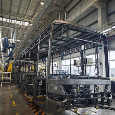 China ODM Linha de montagem de autocarros elétricos de grande capacidade Chassi de autocarro, carroceria de autocarro elétrico, linha de montagem de autocarro à venda