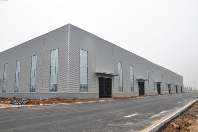 China Estructura de acero estructural Warehouse del braguero de la construcción del marco de acero con la pared del parapeto en venta
