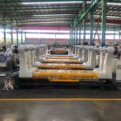 China El rollo de molino hidráulico automático de Shaftless coloca la cadena de producción acanalada de la hoja para el rollo de papel en venta