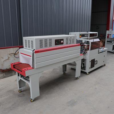 China L Shaped Fully Automatic Shrink Wrap Packing Machine 1.35KW For Food And Beverage for sale