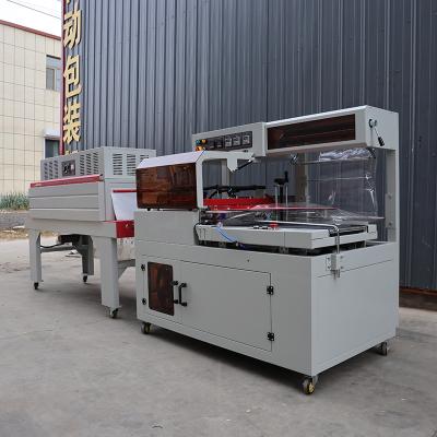 China Máquina de enrolar de calor industrial em forma de L Embalagem de enrolar de alimentos e bebidas personalizável à venda