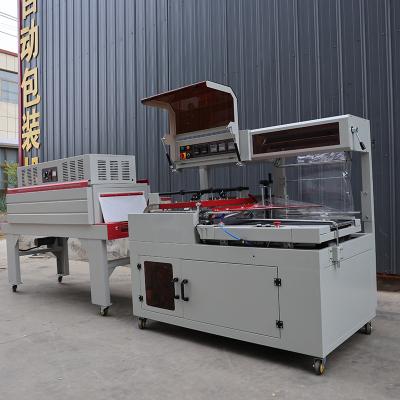 China 1.35KW L máquina de envoltura de sellador de reducción 380V 440V de alimentos L máquina de embalaje sellador en venta