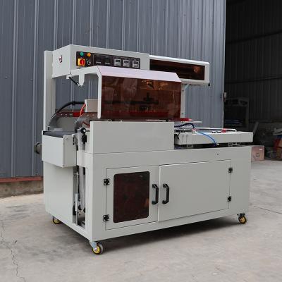 China 220V / 50Hz Fully Automatic Heat Shrink Packaging Machine 0.03 - 0.25mm Film Thickness for sale