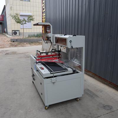 China L Shaped Automatic Heat Shrink Wrapping Machine 220V For Sealed Packaging for sale