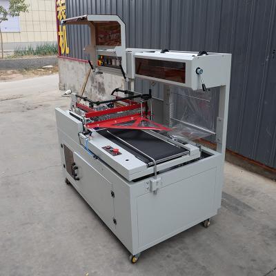 China Stainless Steel Pneumatic Automatic Shrink Wrapper Machine For Packaging for sale