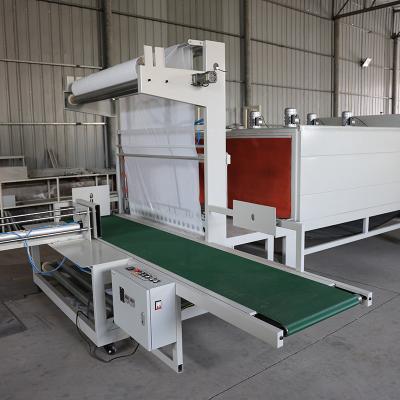 China Automatic Cuff Style Heat Shrink Packaging Machine 220V Power Supply PLC Control for sale