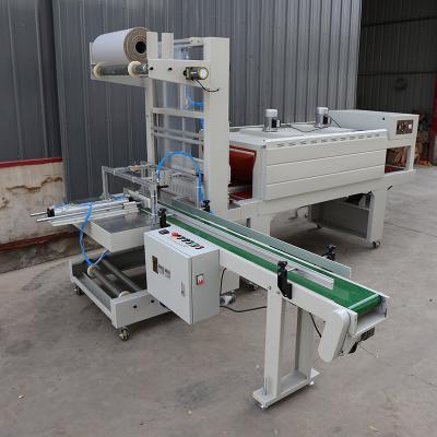 China 2KW Automatic Shrink Wrap Packaging System Cuff Style Stainless Steel for sale