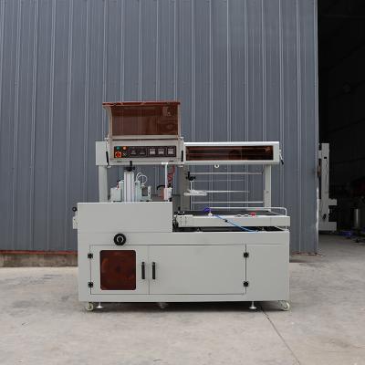 China Customized Logo Pneumatic Heat Shrink Packing Machine With Adjustable Wind Direction for sale