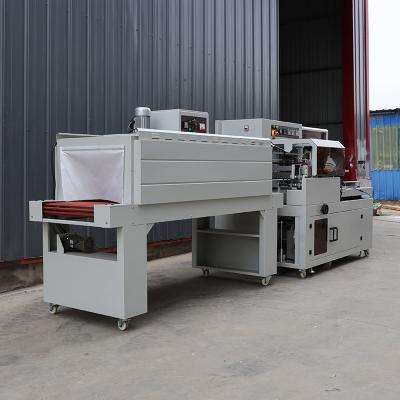 China PLC Control Box Shrink Wrap Machine Customized For Food Beverage Daily Necessities for sale