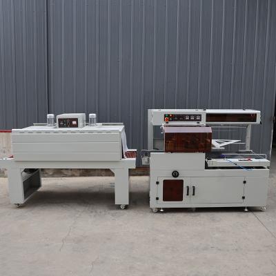 China Plastic Film Heat Shrink Film Packaging Machine Stainless Steel Customized for sale