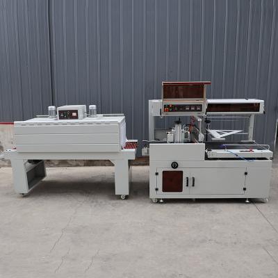 China Plastic Heat Shrink Film Packaging Machine Multifunctional Sealing Cutting Machine for sale